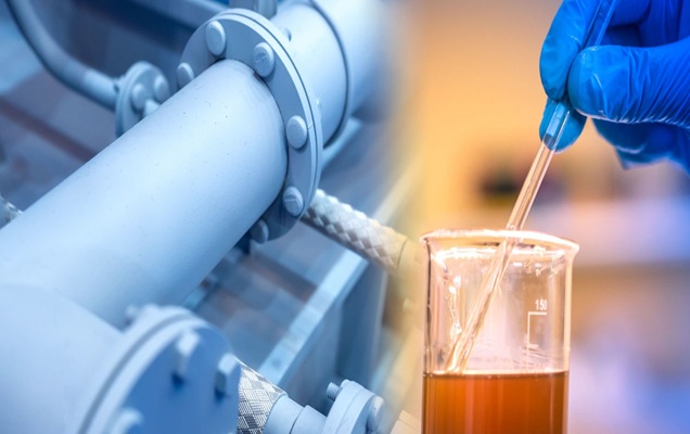 Chemical analysis at the enterprise. The job of a chemist in the workplace. The hands of the laboratory assistant hold the container with the sample of the substance.